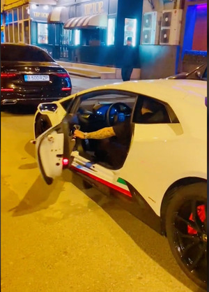 Screenshot from Tiktok showing Bogdan driving a Lamborghini