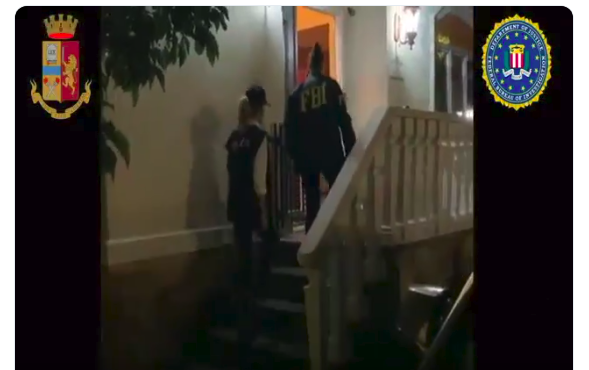 FBI agents enter a home in connection to the "New Connection" case (Source: Polizia di Stato Twitter