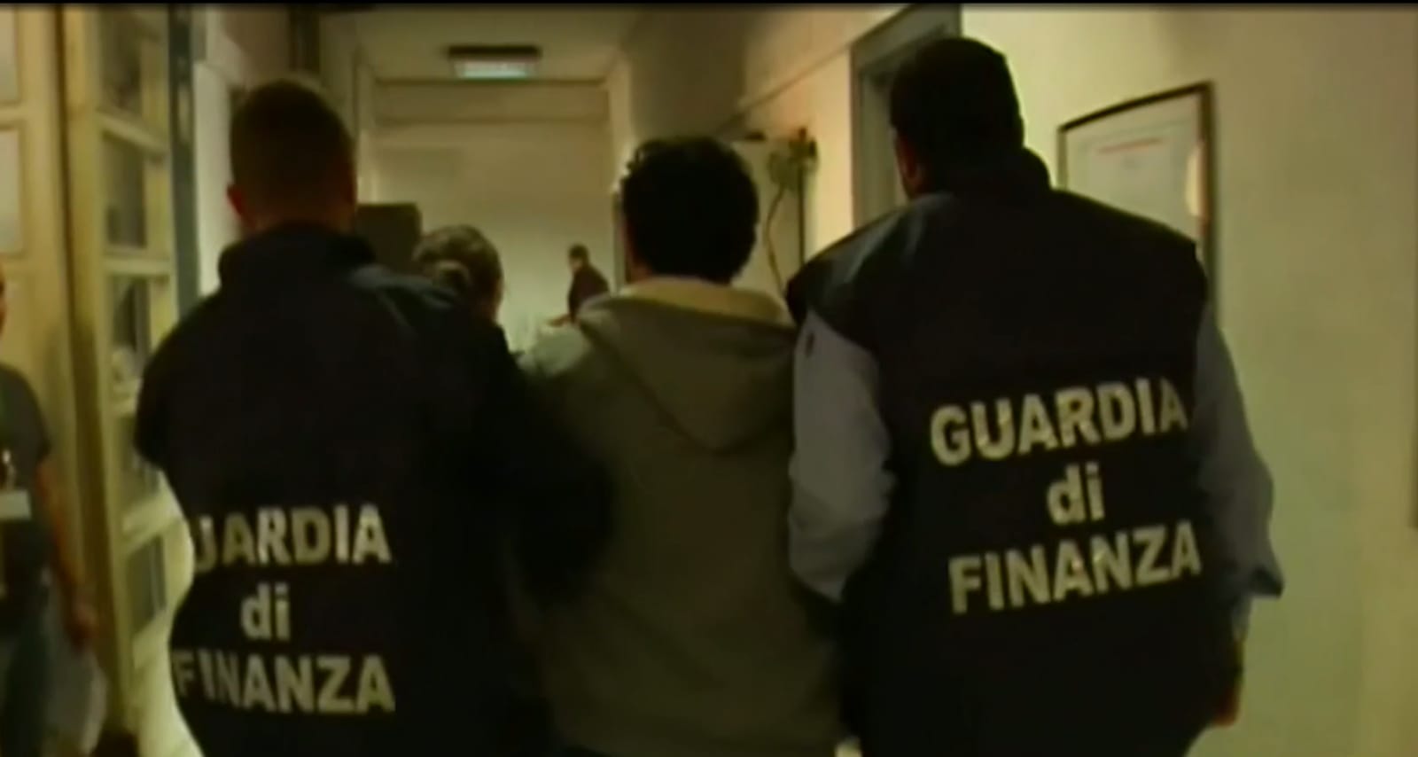 One of the suspects is arrested. (Photo: Guardia di Finanza)