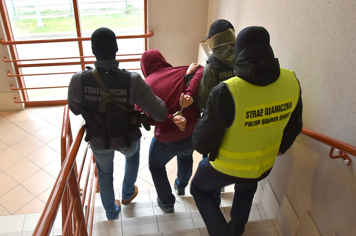 Polish police are seen taking away a suspected human trafficker. (Europol)