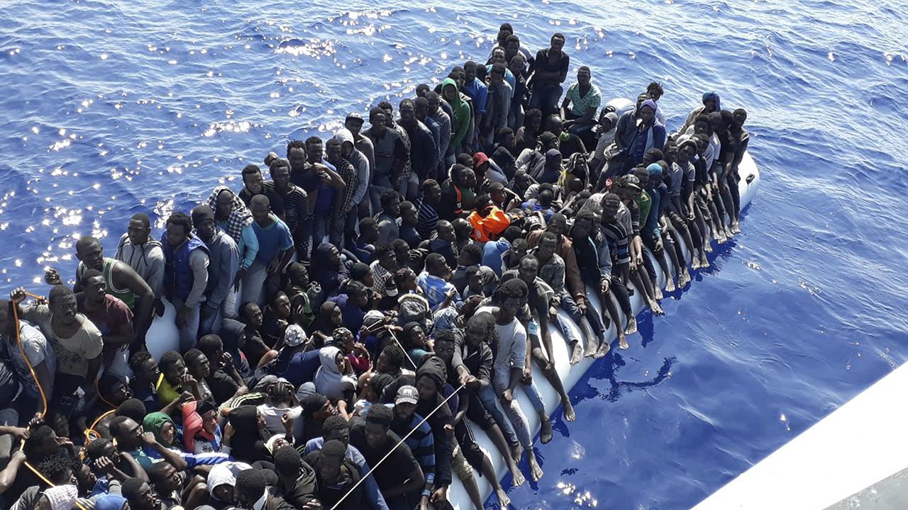 Photo released by the Libyan Coast Guard on June 24, 2018 shows migrants on a ship intercepted offshore near the town of Gohneima, east of the capital, Tripoli. There were four boats, boarding 490 African migrants including 75 women and 21 children, Spokesman Ayoub Gassim said. (Libyan Coast Guard via AP)