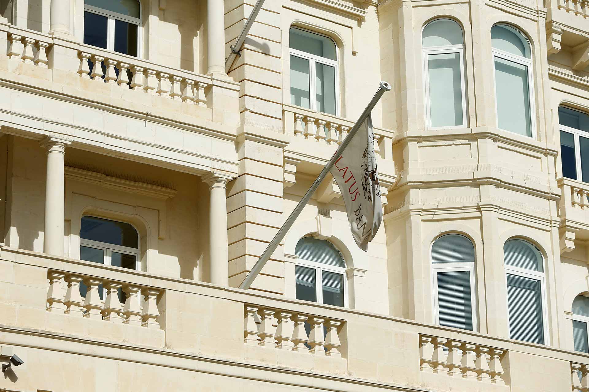 The flag of Pilatus Bank flies from its offices in Whitehall Mansions in Ta’ Xbiex, Malta. Photo (c): REUTERS/Darrin Zammit Lupi